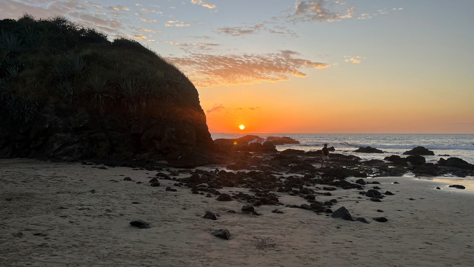 Playa Grande beach at sunset with rocky headland and Pacific Ocean, Guanacaste Costa Rica