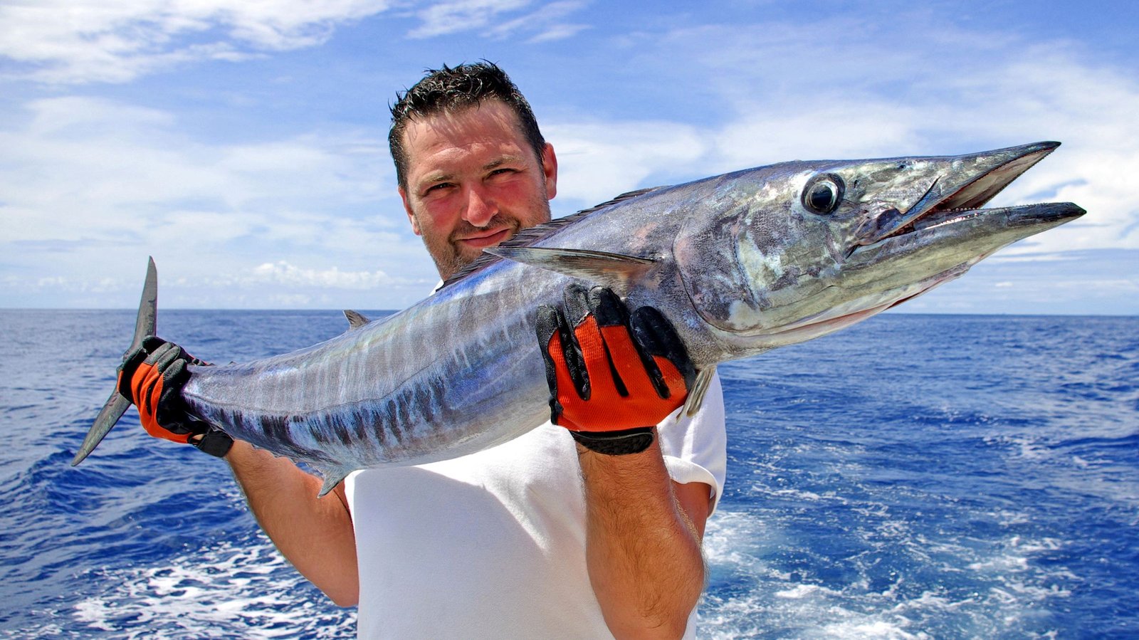 Costa Rica deep sea fishing charter boat at golden hour on the Pacific coast of Guanacaste